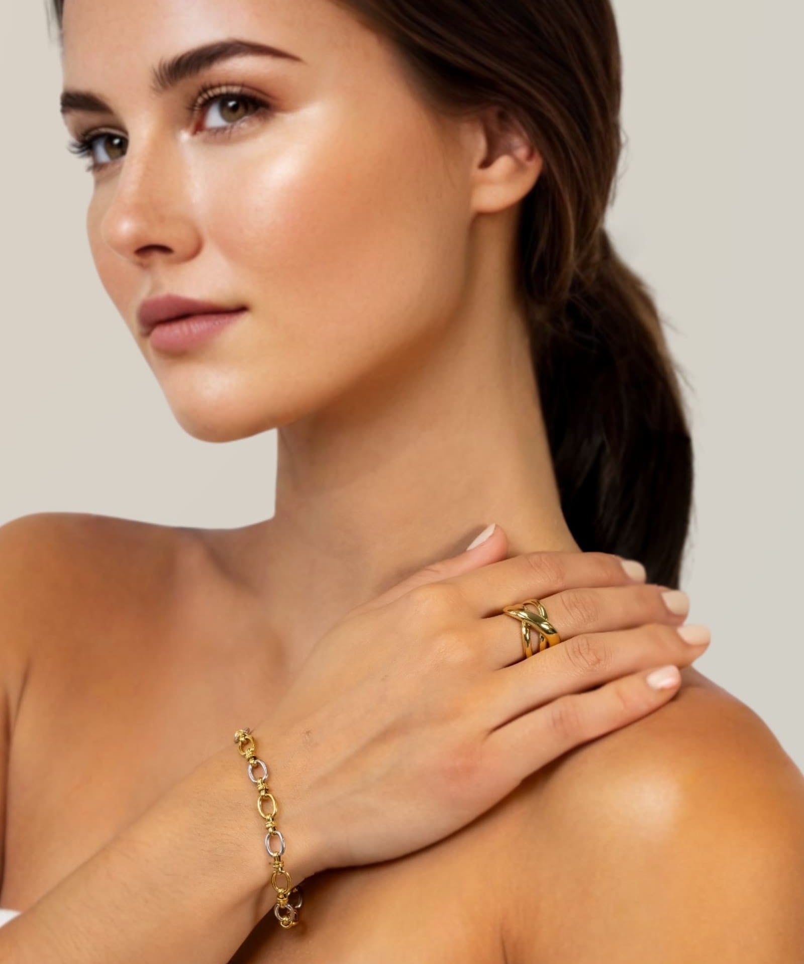 Fia Two Tone Link Bracelet by Lavana on model alternating gold and silver oval links