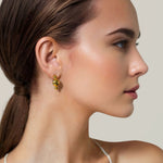 Floating Pebble Gold Huggie Earrings by Lavana on model smooth pebble domes with cool gloss