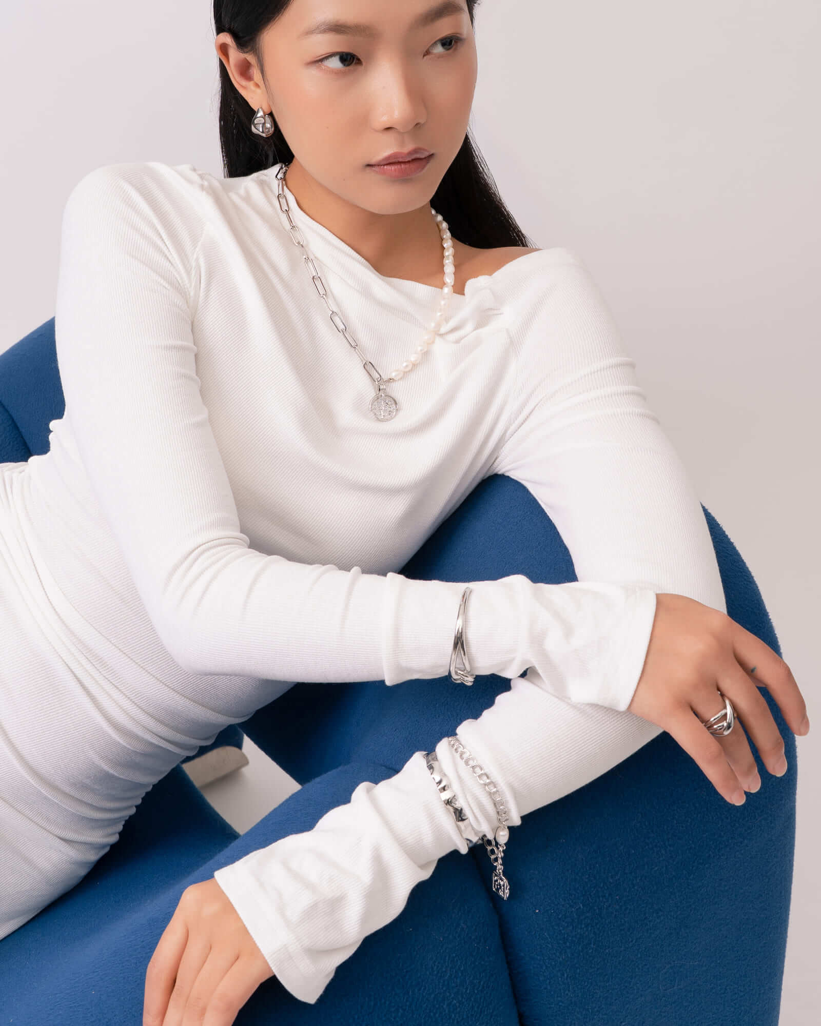 Fluidity Silver Cuff Bangle by Lavana, on model; modern organic rippled open cuff