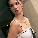 Formation Silver Hoop Earrings by LAVANA, on model; sculpted dress hoops  with subtle textured shape