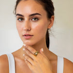 Glide Gold Chunky Crossover Statement Ring by Lavana on model with polished curves