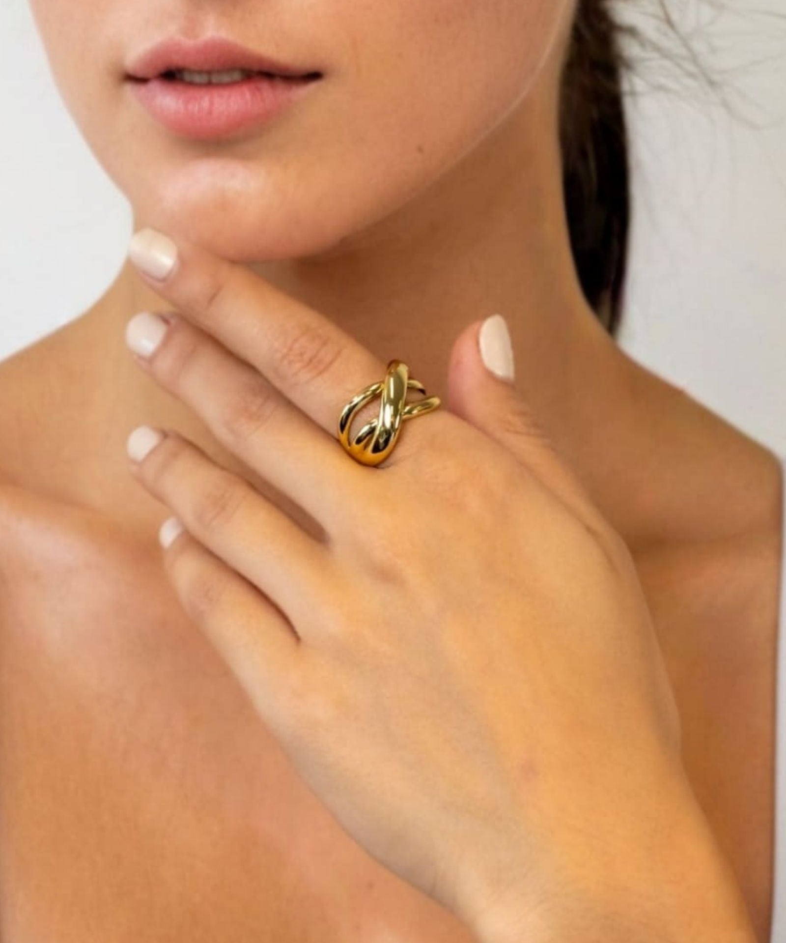 Glide Gold Chunky Crossover Statement Ring by Lavana on model with polished curves