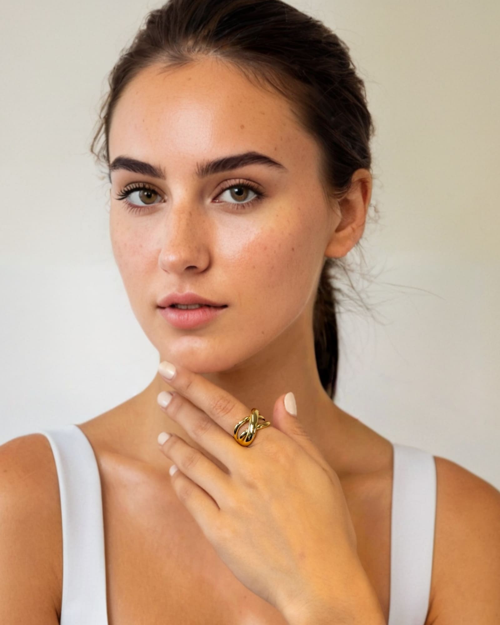 Glide Gold Chunky Crossover Statement Ring by Lavana on model with polished curves