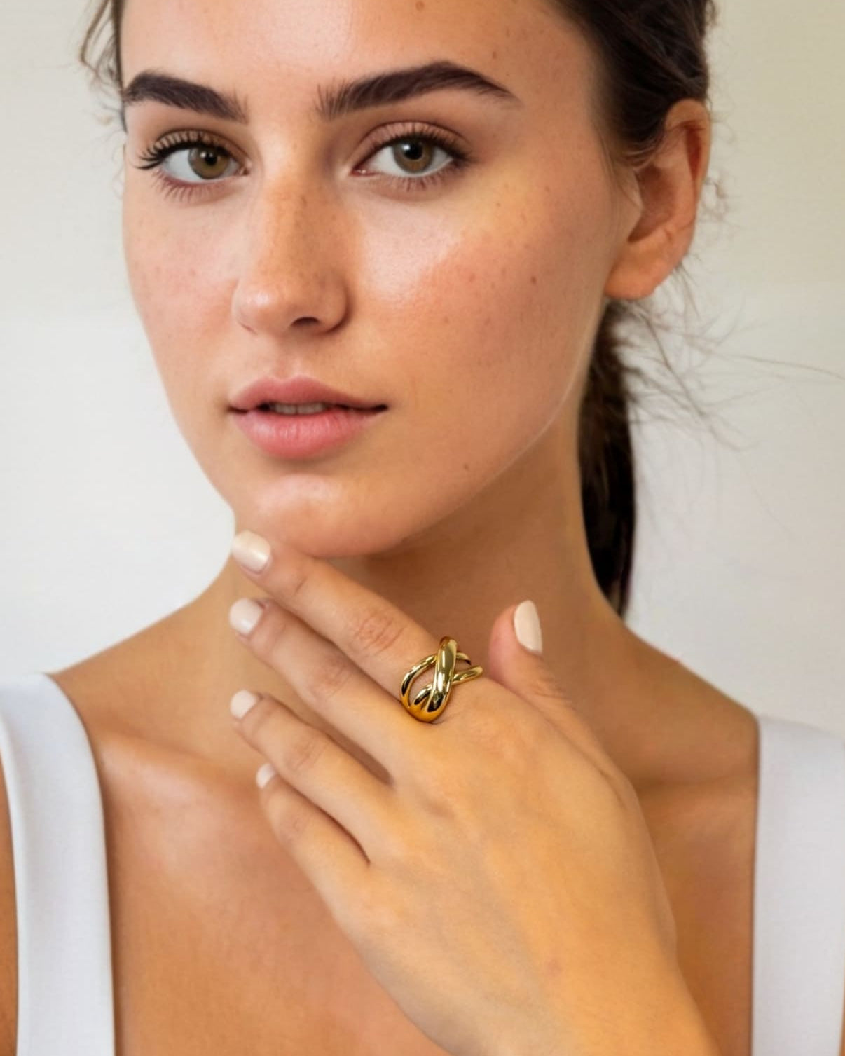 Glide Gold Chunky Crossover Statement Ring by Lavana on model with polished curves