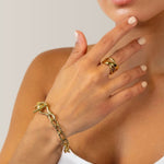 Glide Gold Chunky Crossover Statement Ring by Lavana on model with polished curves