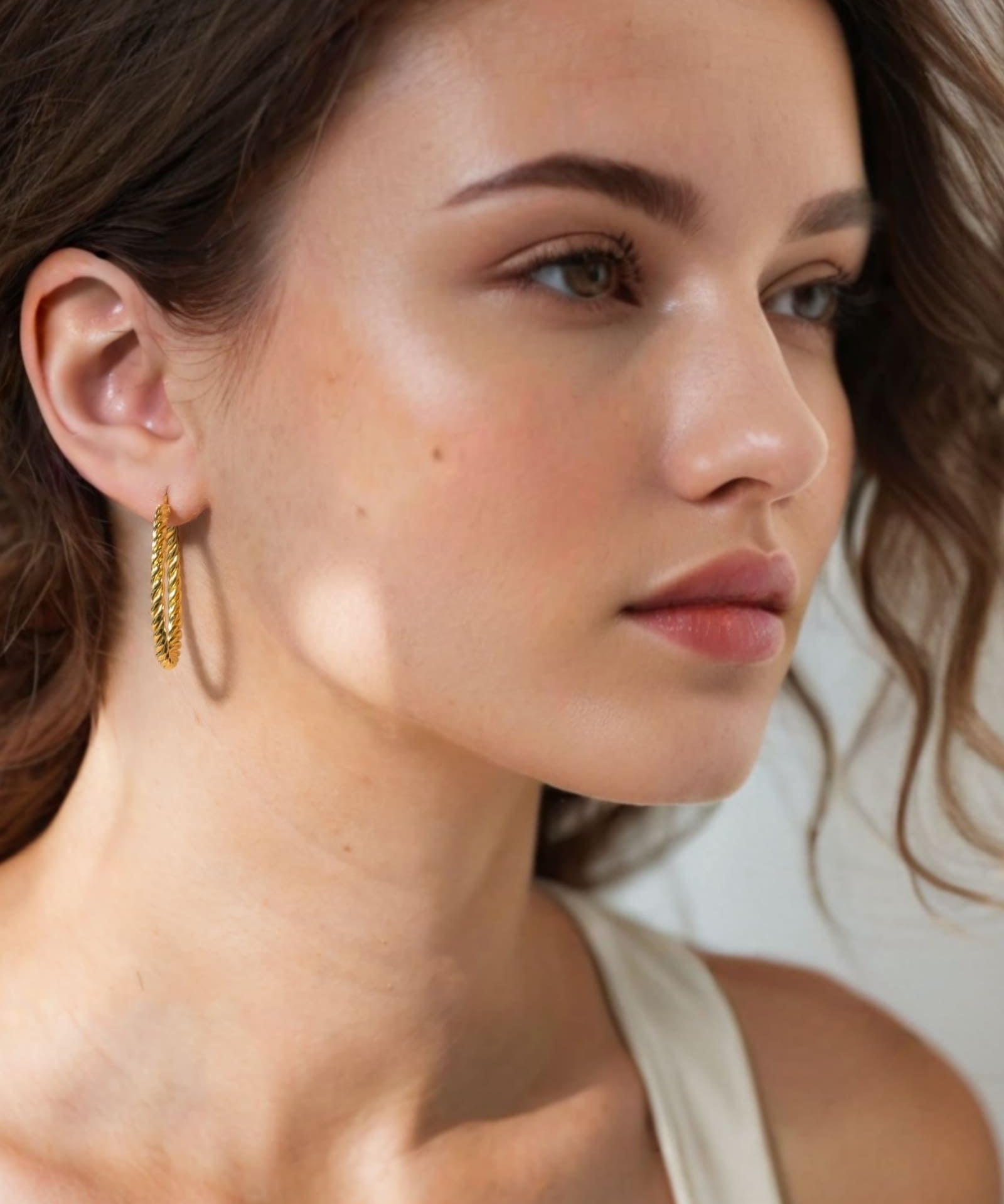 Grace Gold Hoop Earrings by Lavana on model large lightweight hoops with diagonal grooves