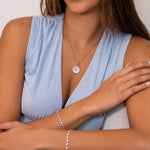 Guiding Stars Diamond Pendant by Lavana on model in polished sterling silver with celestial star map