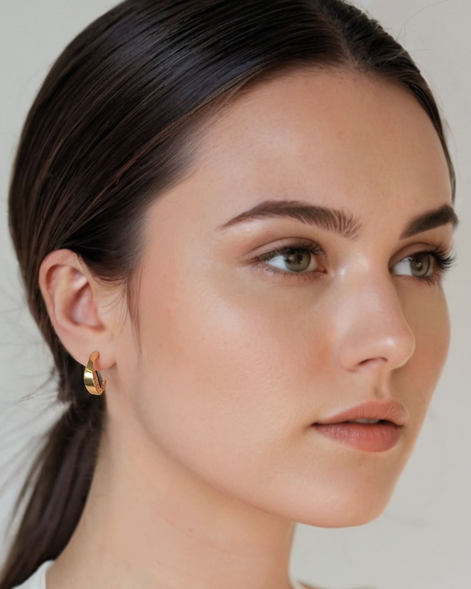 Half Moon Gold Hoop Earrings by Lavana on model polished front with open lattice crescent