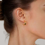Half Moon Gold Hoop Earrings by Lavana on model polished front with open lattice crescent
