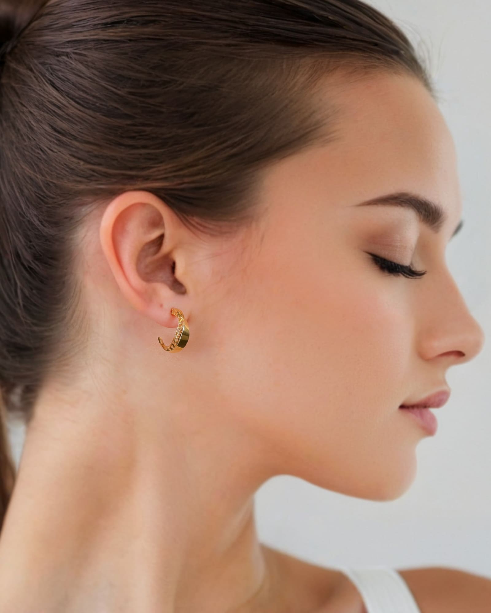 Half Moon Gold Hoop Earrings by Lavana on model polished front with open lattice crescent