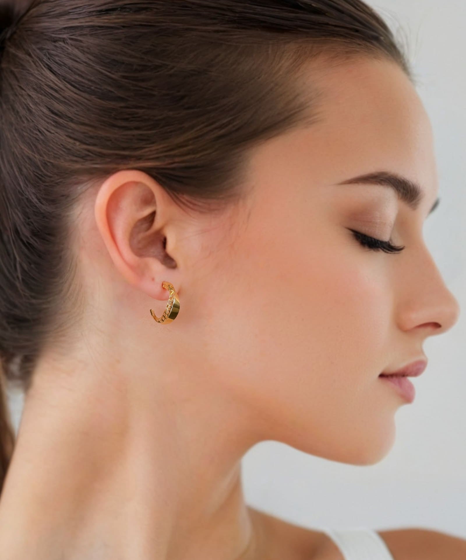 Half Moon Gold Hoop Earrings by Lavana on model polished front with open lattice crescent