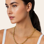 Harmony Gold Charm Necklace by Lavana, on model; paperclip and rolo mix with openable oval link