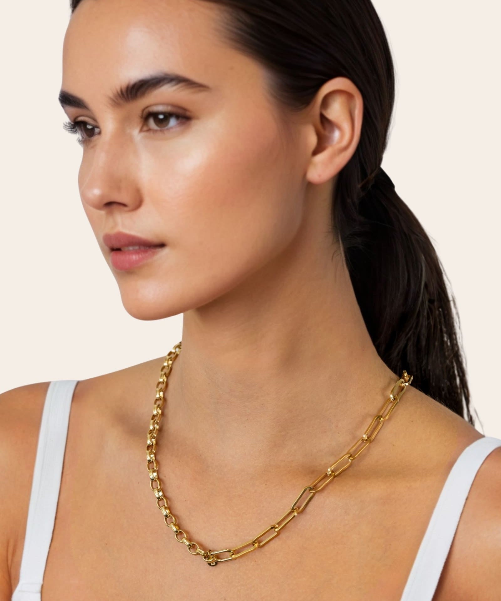 Harmony Gold Charm Necklace by Lavana, on model; paperclip and rolo mix with openable oval link
