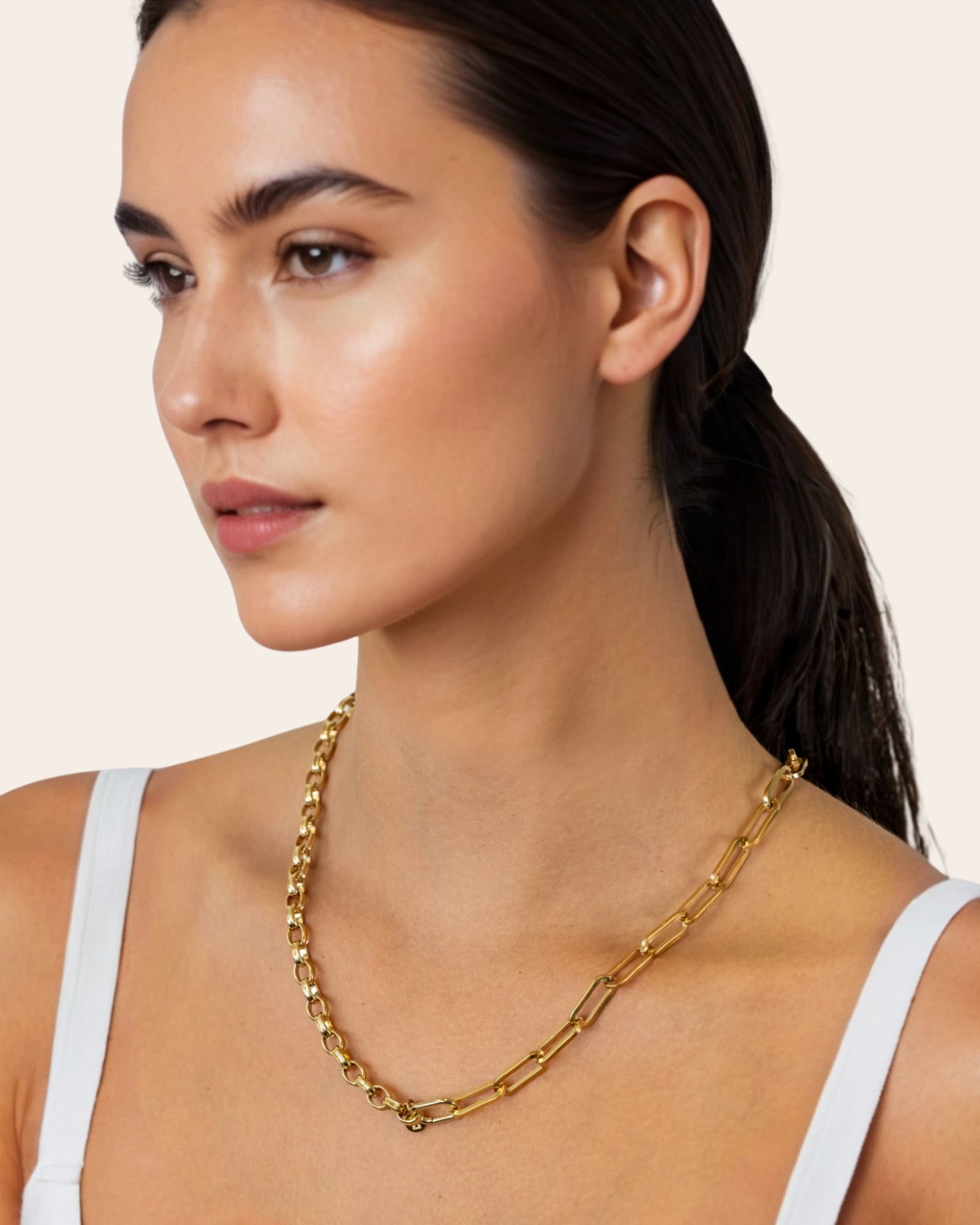 Harmony Gold Charm Necklace by Lavana, on model; paperclip and rolo mix with openable oval link