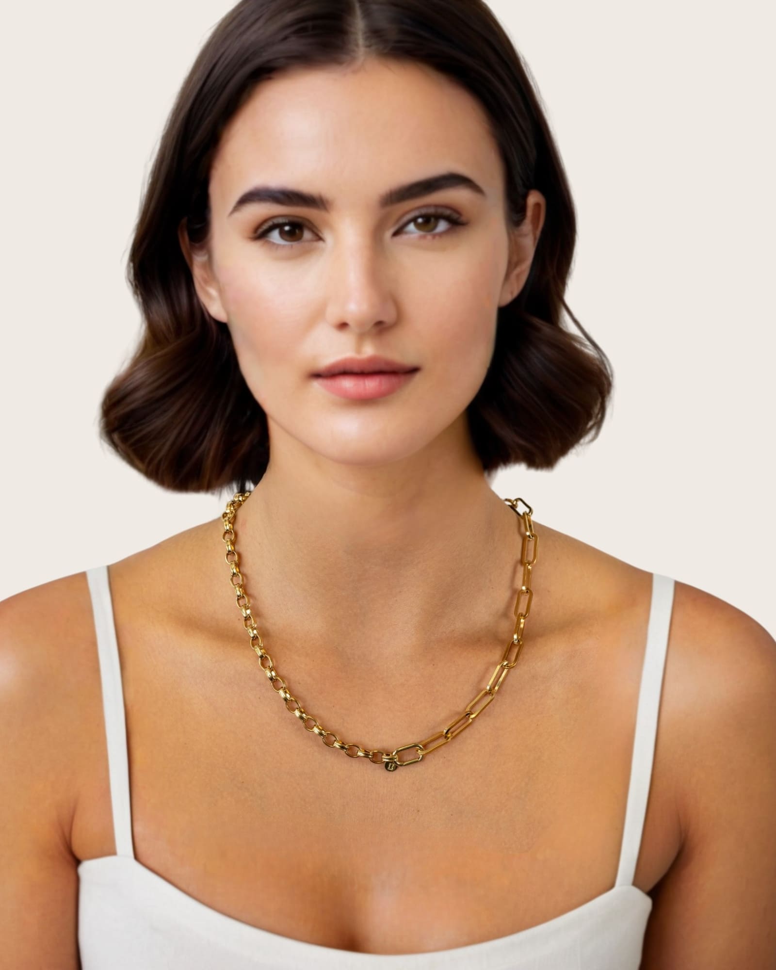 Harmony Gold Charm Necklace by Lavana, on model; paperclip and rolo mix with openable oval link