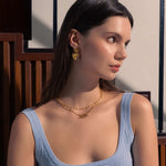 Heartlock Gold Paperclip Necklace by Lavana, on model; modern paperclip chain with front heart T-bar clasp