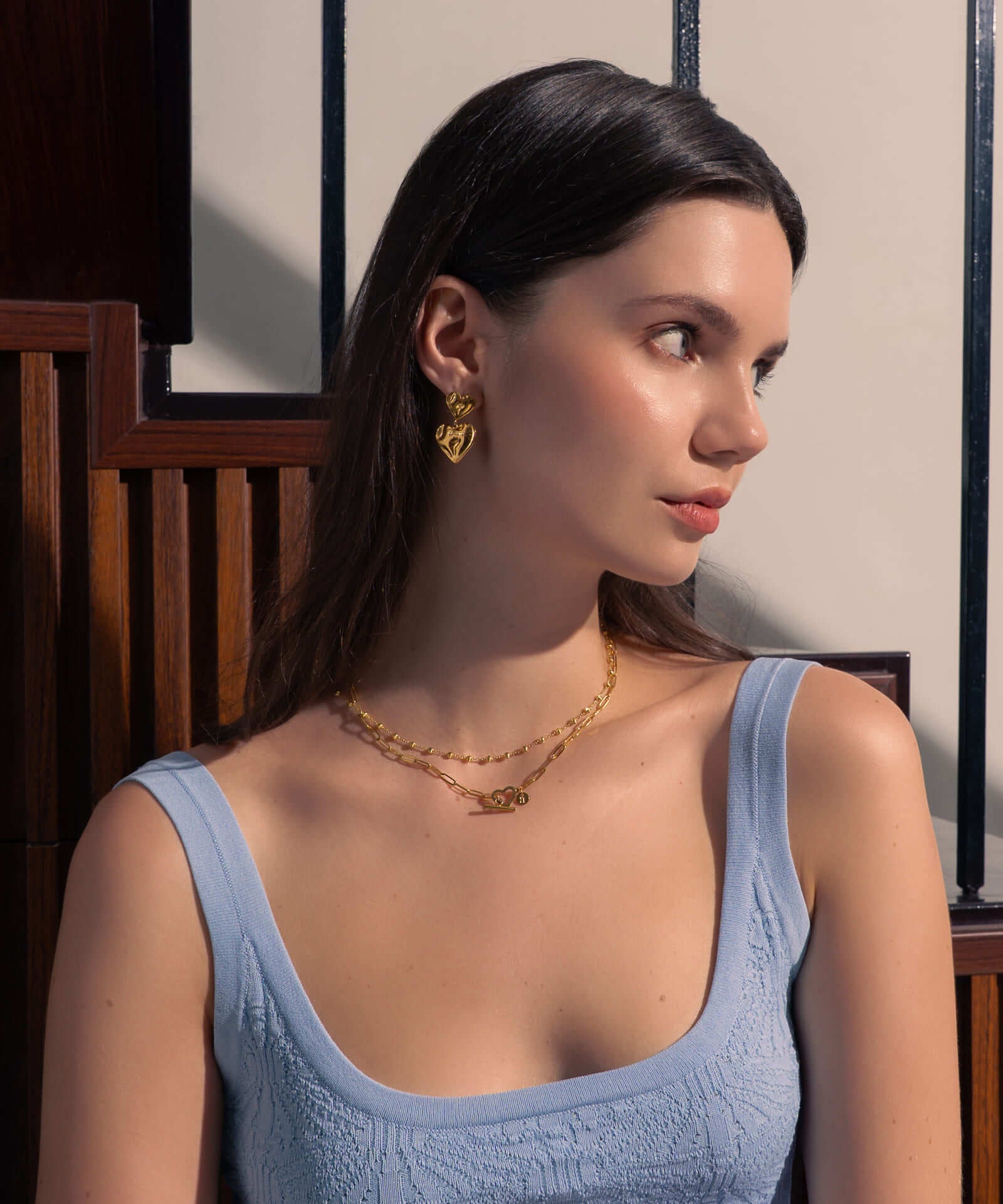 Heartlock Gold Paperclip Necklace by Lavana, on model; modern paperclip chain with front heart T-bar clasp