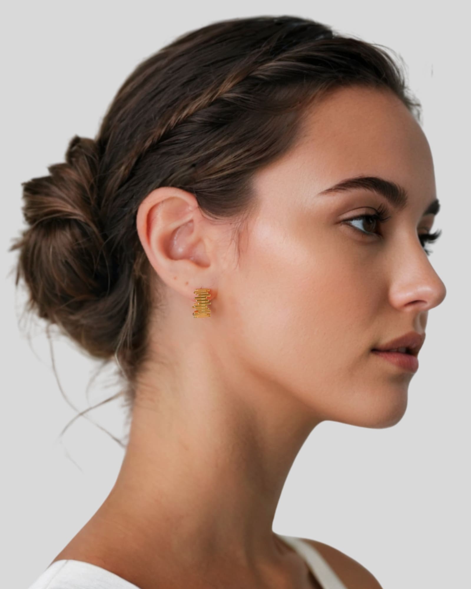 Horizon Gold Hoop Earrings by Lavana on model wide geometric hoops with jagged horizon lines