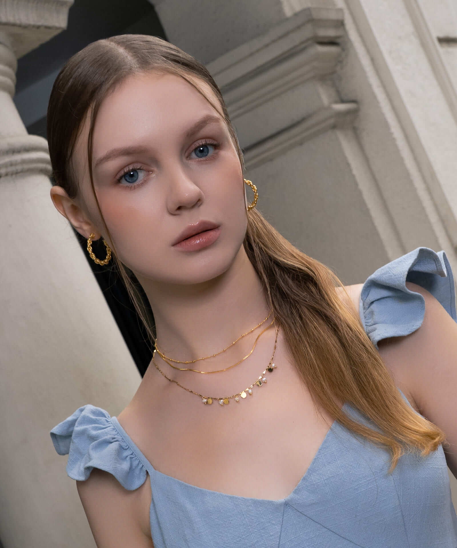 Interlace Gold Hoop Earrings by LAVANA, on model; large dress hoops with polished rope twist 