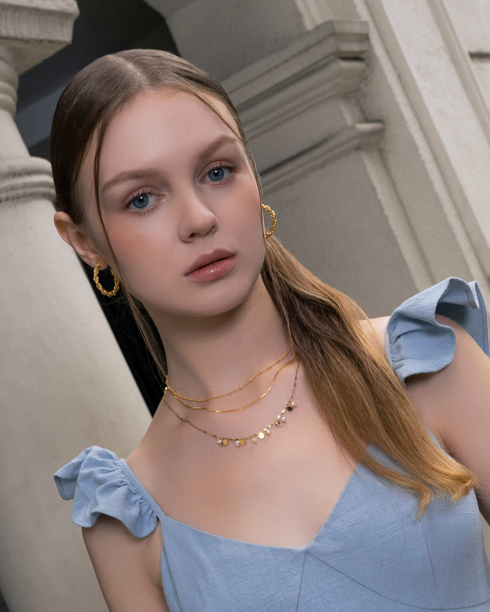 Interlace Gold Hoop Earrings by LAVANA, on model; large dress hoops with polished rope twist 