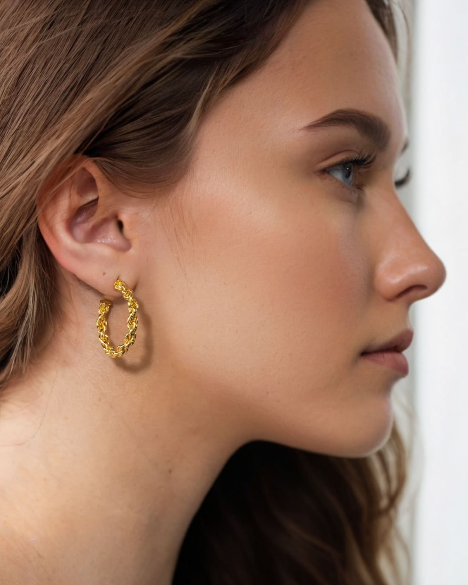 Interlace Gold Hoop Earrings by Lavana on model polished rope twist full hoop