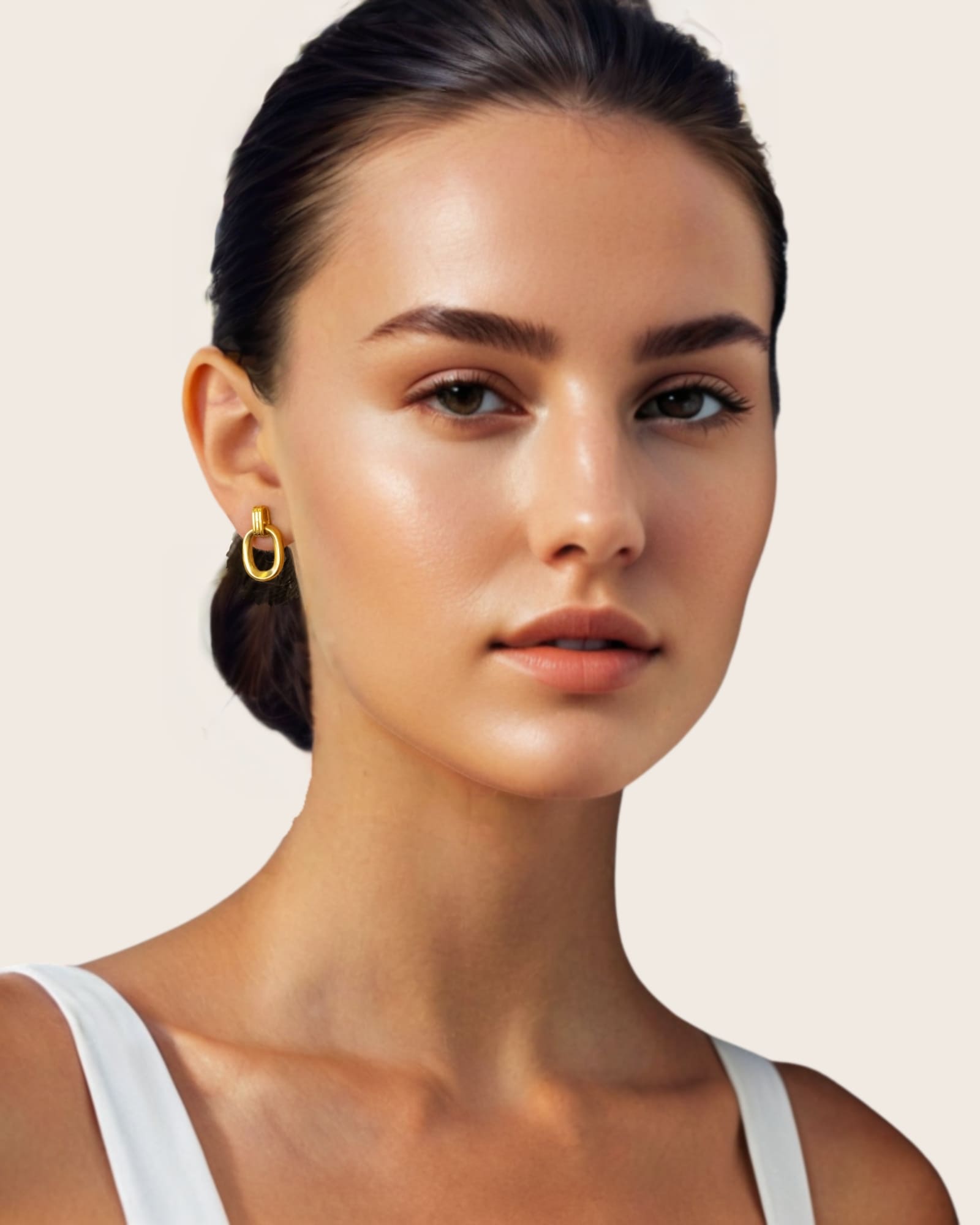 Jojo Gold Oblong Earrings by Lavana, on model; ribbed top with polished oblong drop