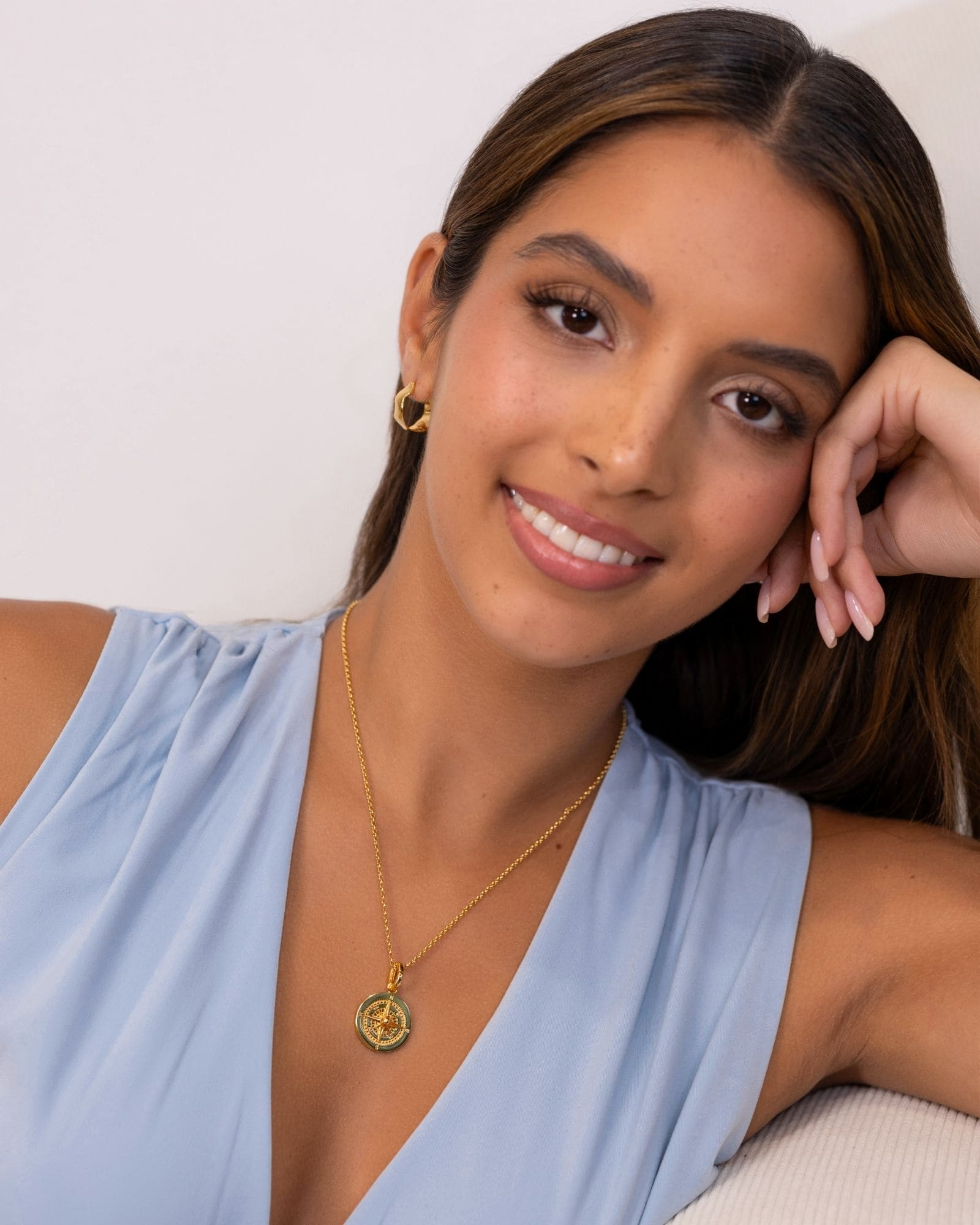 Journey Compass Gold Pendant by Lavana on model in 18k gold plated with map detail