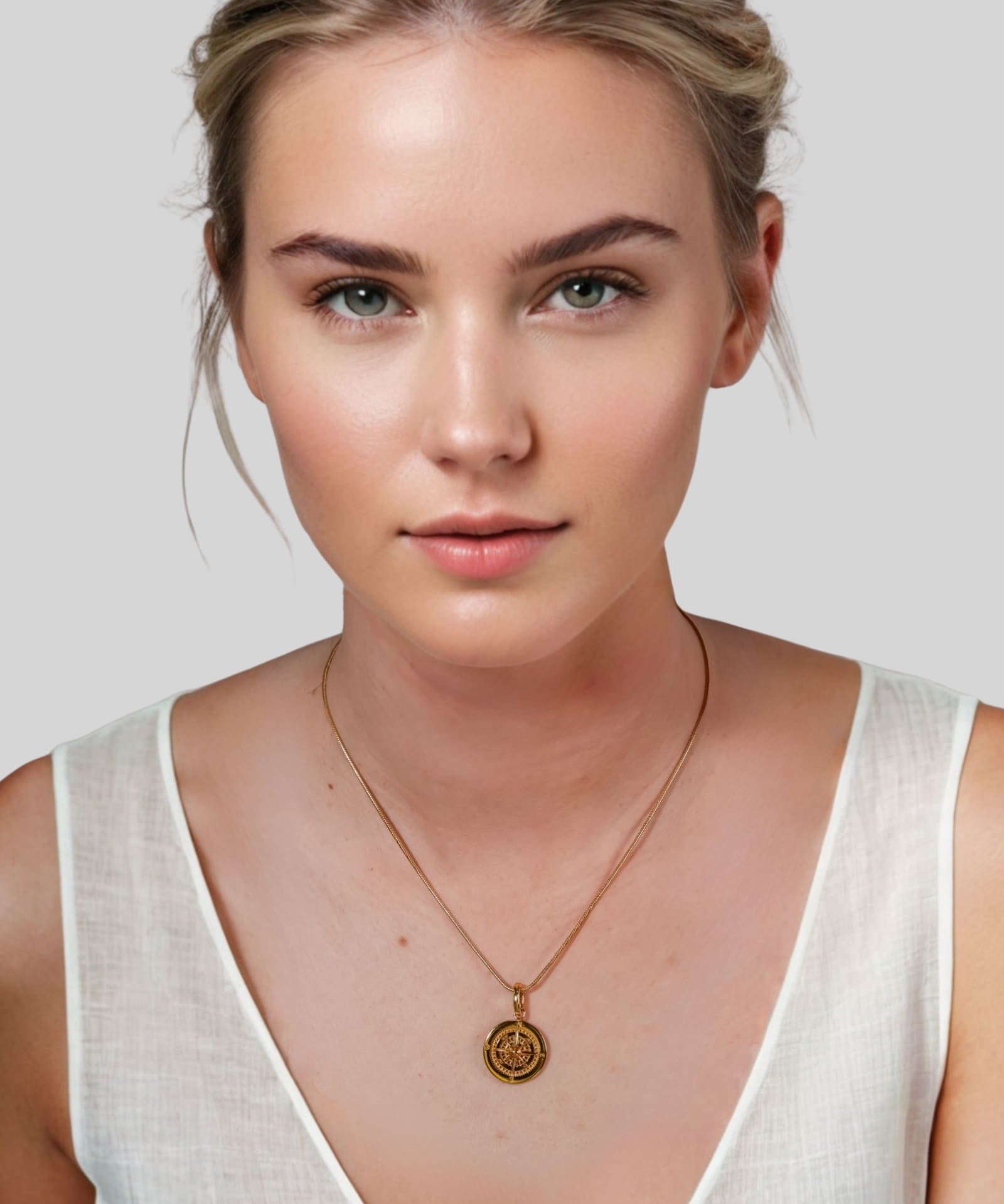 Journey Compass Pendant by Lavana on model in 18k gold plated with map detail