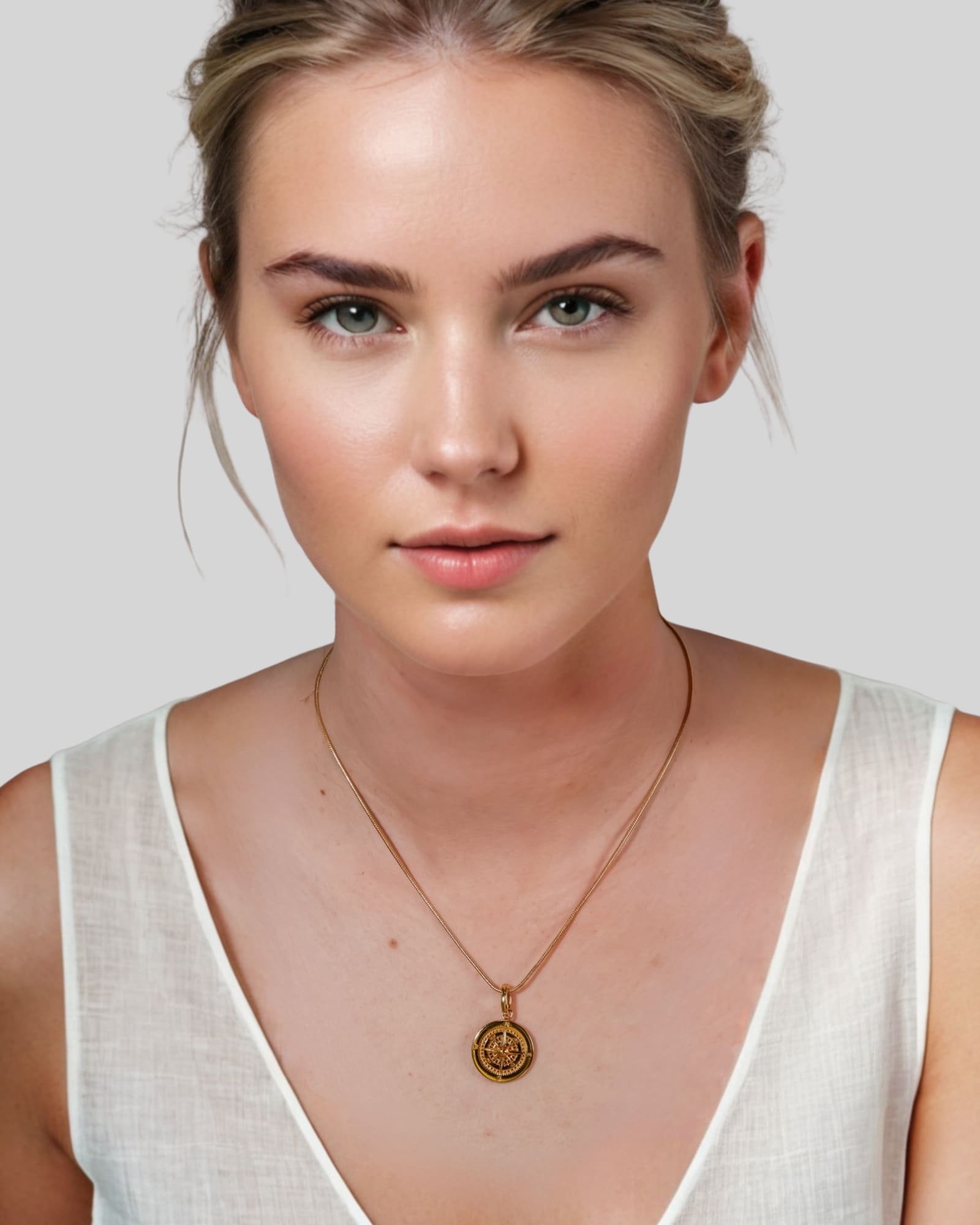 Journey Compass Pendant by Lavana on model in 18k gold plated with map detail