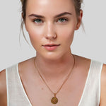 Journey Compass Pendant by Lavana on model in 18k gold plated with map detail