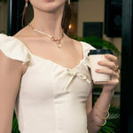 Large Illuminate gold diamond bracelet by Lavana, on model; large classic bezel set lab grown diamonds and slider adjuster