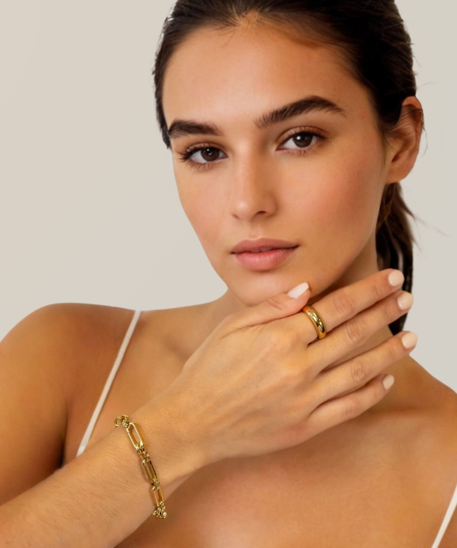 Latch Link Gold Bracelet by Lavana on model elongated oblong links with four openable links for charms