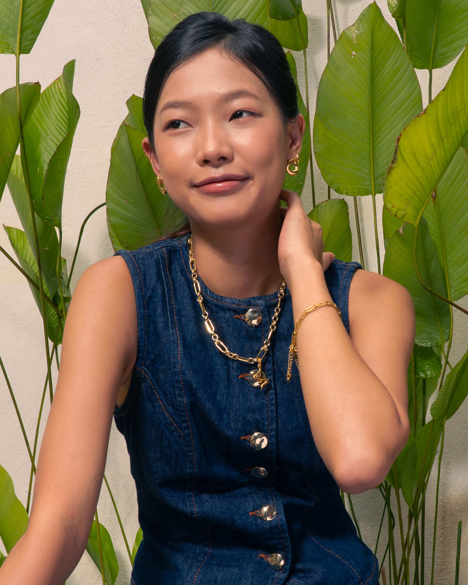 Latch Link Gold Necklace by Lavana, on model; paperclip chain five charm links Fluid pendant sculptural wave silho