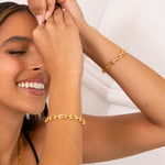 Lavana Signature Gold Diamond Bangle on model with logo motif links and lab grown diamonds