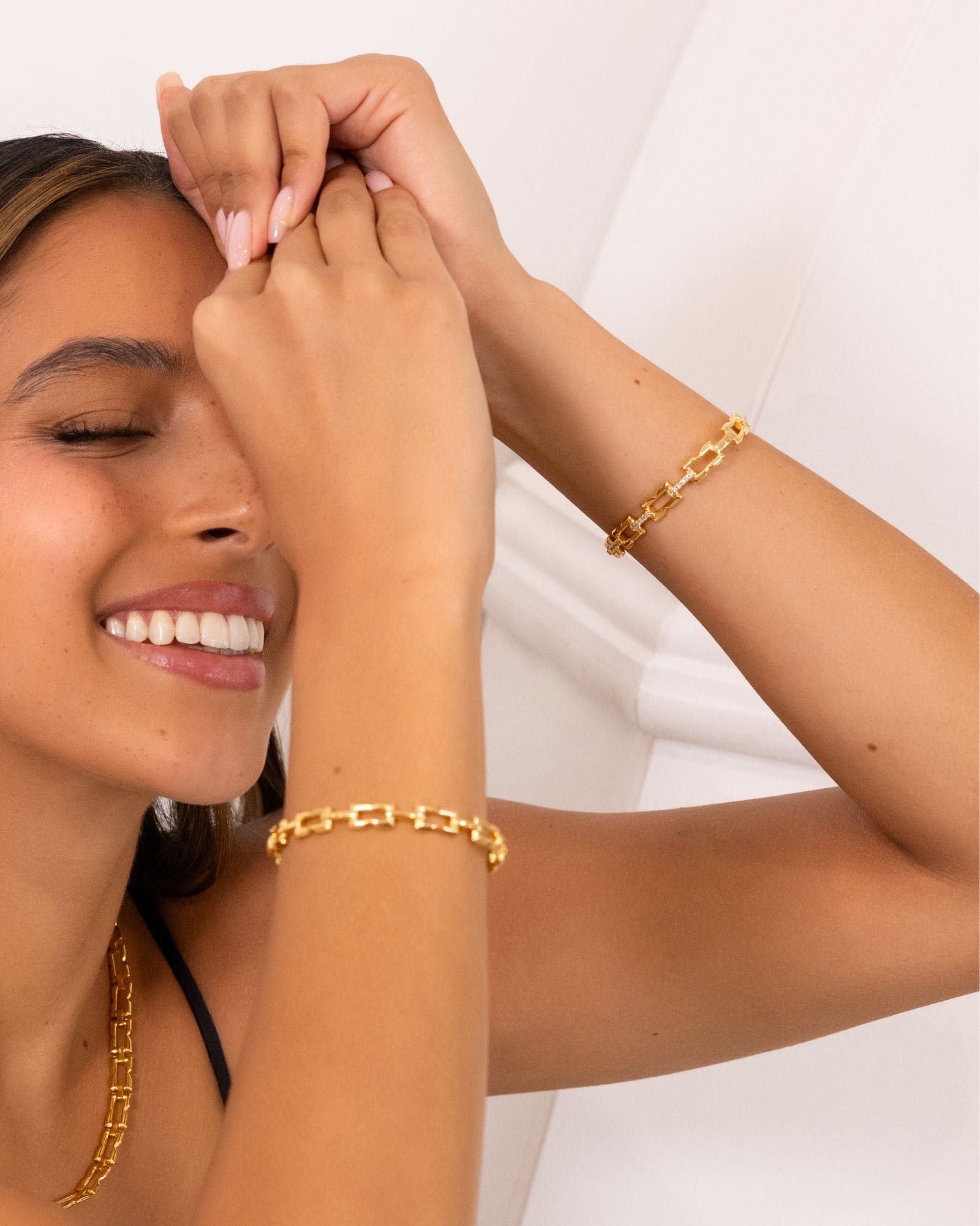 Lavana Signature Gold Diamond Bangle on model with logo motif links and lab grown diamonds