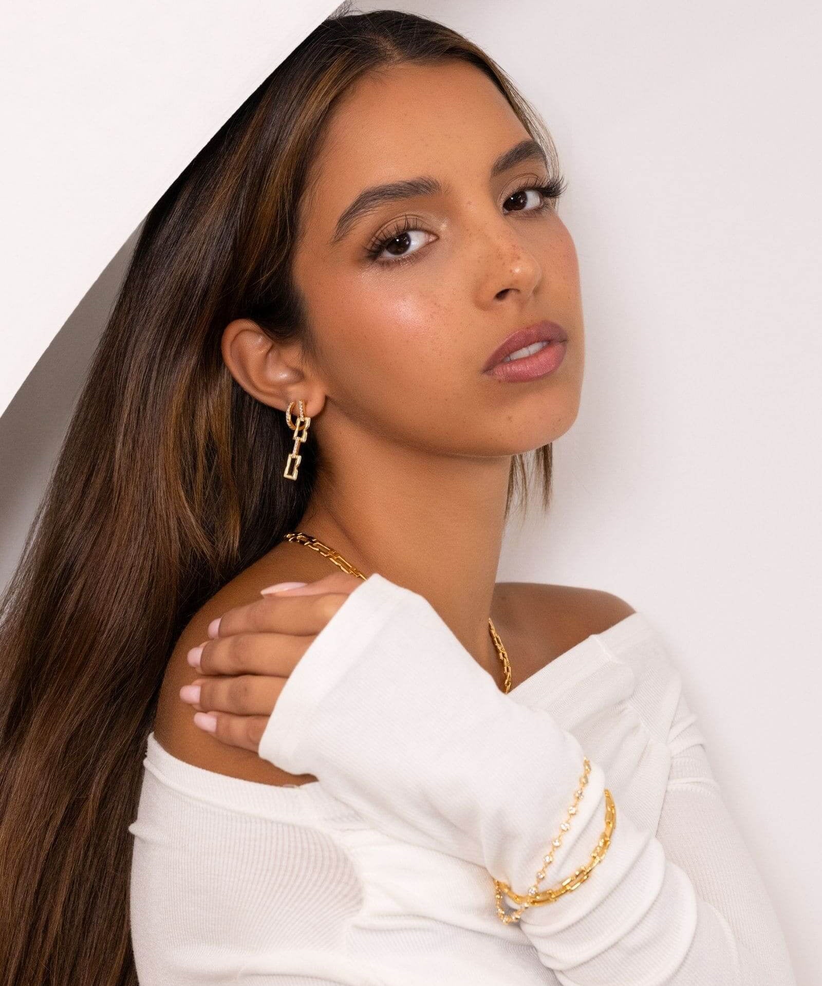 Lavana Signature Gold Diamond Earrings on model drop earrings in gold vermeil with lab grown diamonds