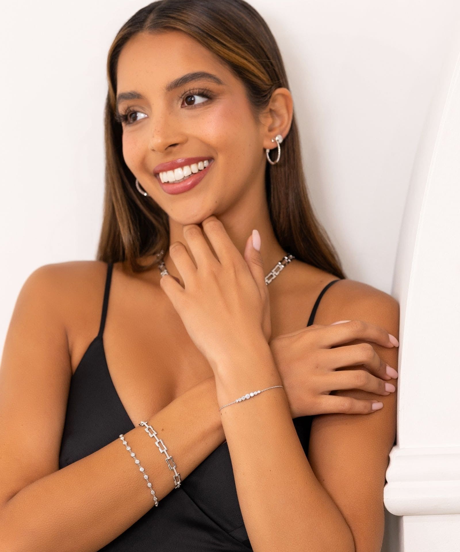 Lavana Signature Silver Diamond Bracelet on model with logo motif links and lab grown diamonds