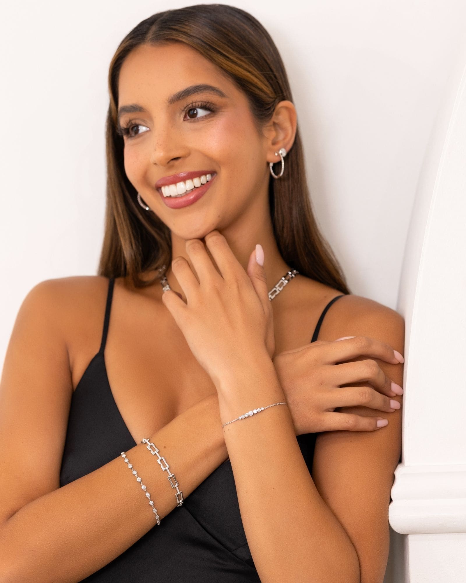 Lavana Signature Silver Diamond Bracelet on model with logo motif links and lab grown diamonds