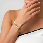LAVANA Signature Gold Diamond Bracelet on model with logo motif links and lab grown diamonds