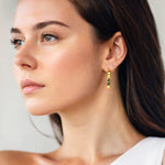 Luna Gold Extra Large Hoop Earrings by Lavana on model polished classic 4mm hoops available in four sizes