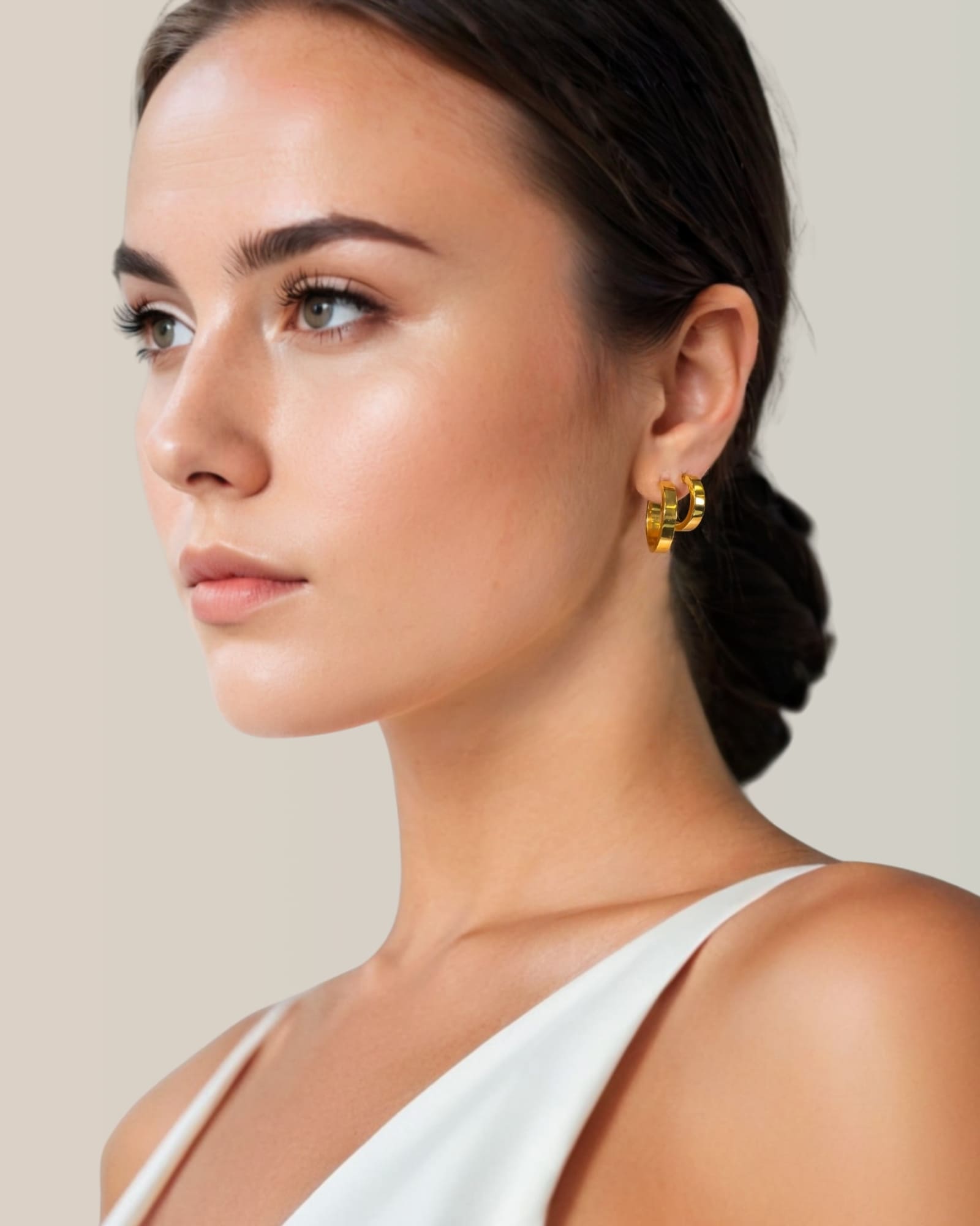 Luna Gold Hoop Earrings Small and Medium by Lavana on model polished classic 4mm hoops available in four sizes layered