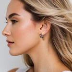 Luna Gold Small Hoop Earrings by Lavana on model polished classic 4mm hoops available in four sizes