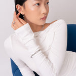 Luxe Link Silver Bracelet by Lavana, on model; modern elongated links with polished spheres on T-bar