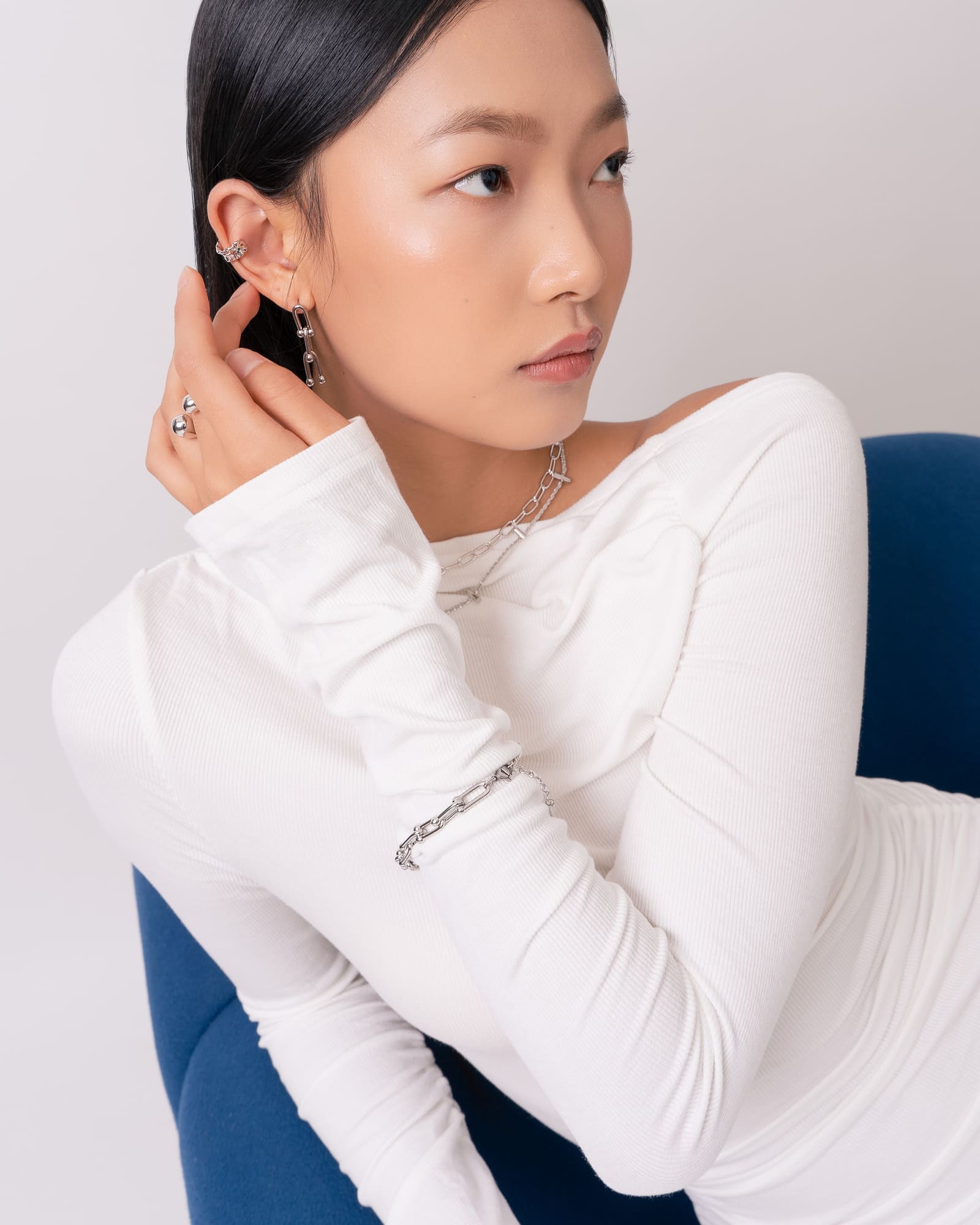 Luxe Link Silver Bracelet by Lavana, on model; modern elongated links with polished spheres on T-bar