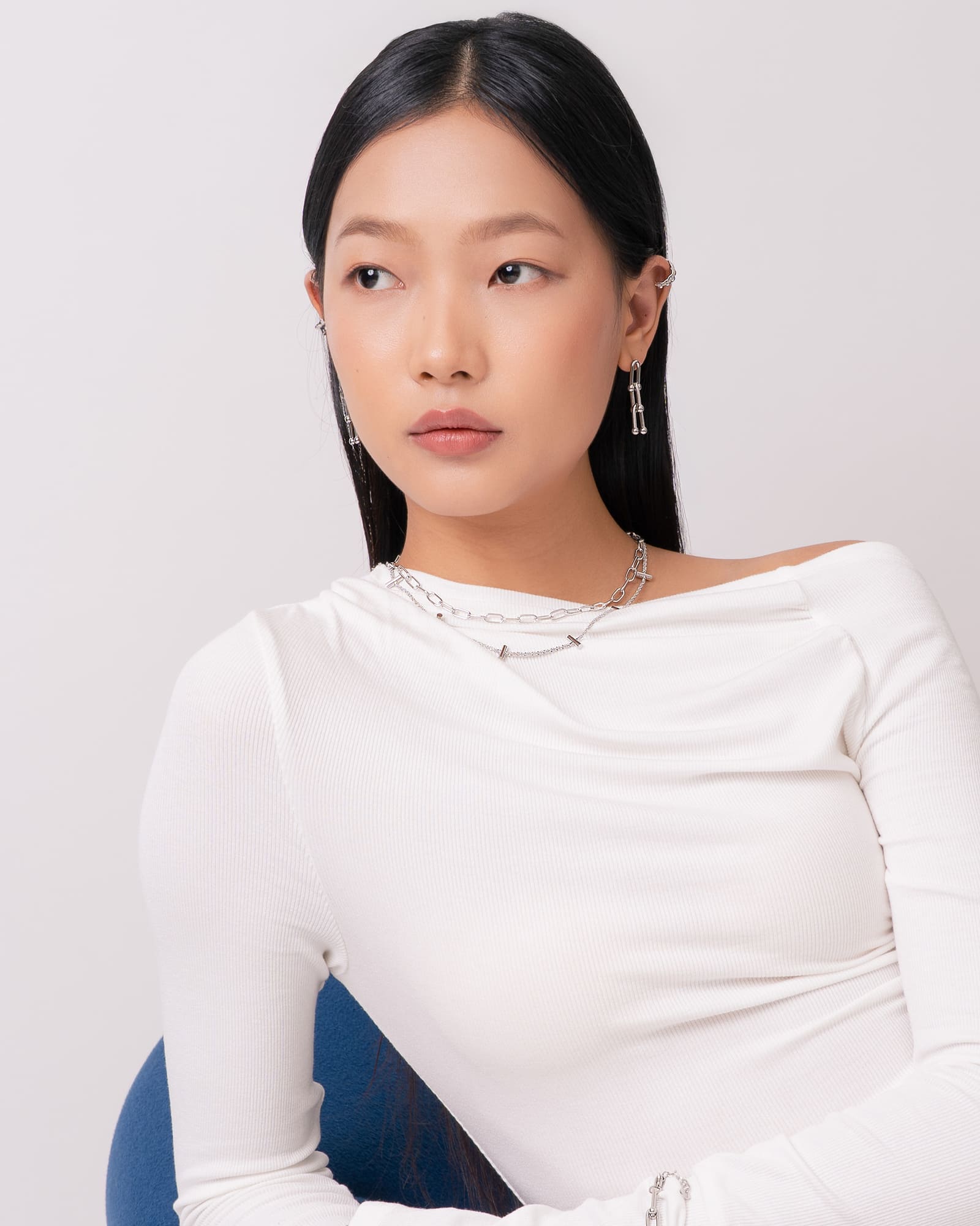 Luxe Link Silver Earrings by Lavana, on model; modern elongated link drops with polished spheres 
