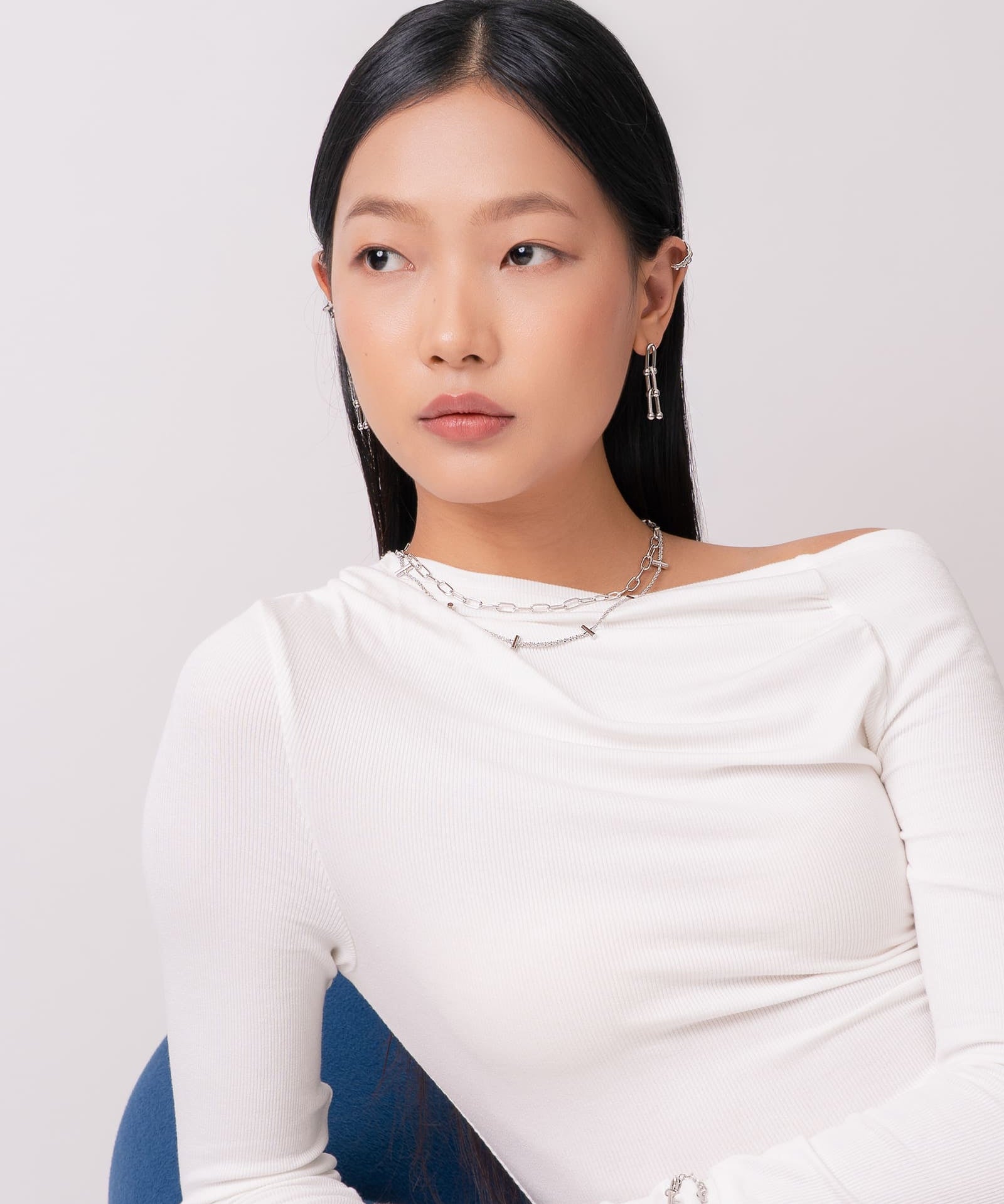 Luxe Link Silver Earrings by Lavana, on model; modern elongated link drops with polished spheres 