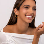 Madrid Gold Diamond Hoop Earrings by Lavana on model in 18k gold vermeil brilliant round cut pave lab grown diamonds