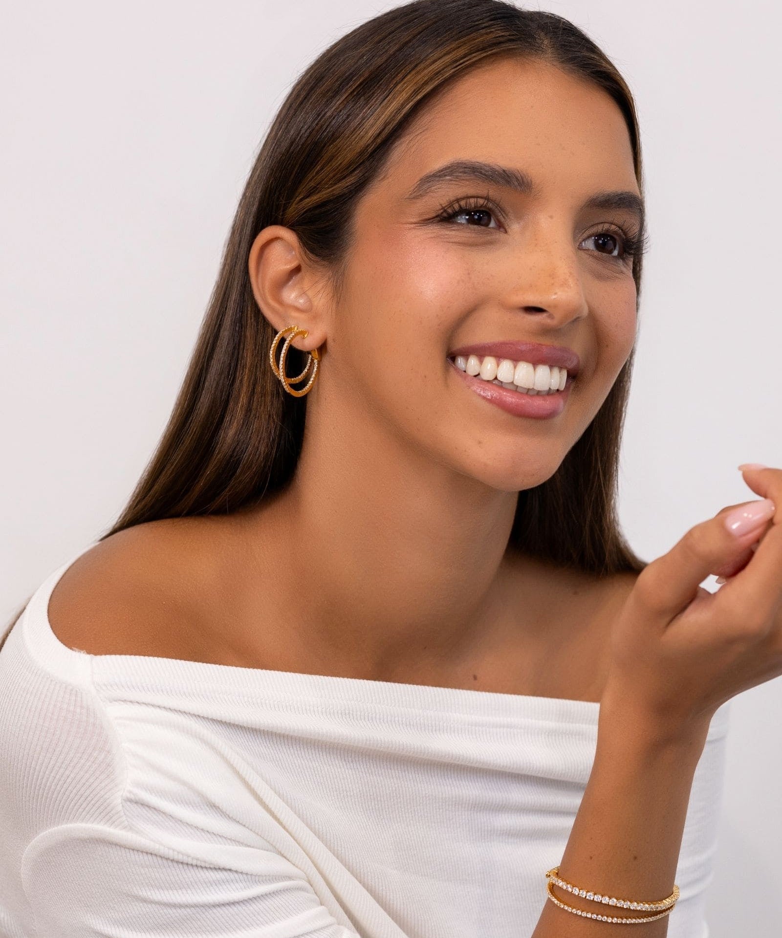 Madrid Gold Diamond Hoop Earrings by Lavana on model in 18k gold vermeil brilliant round cut pave lab grown diamonds