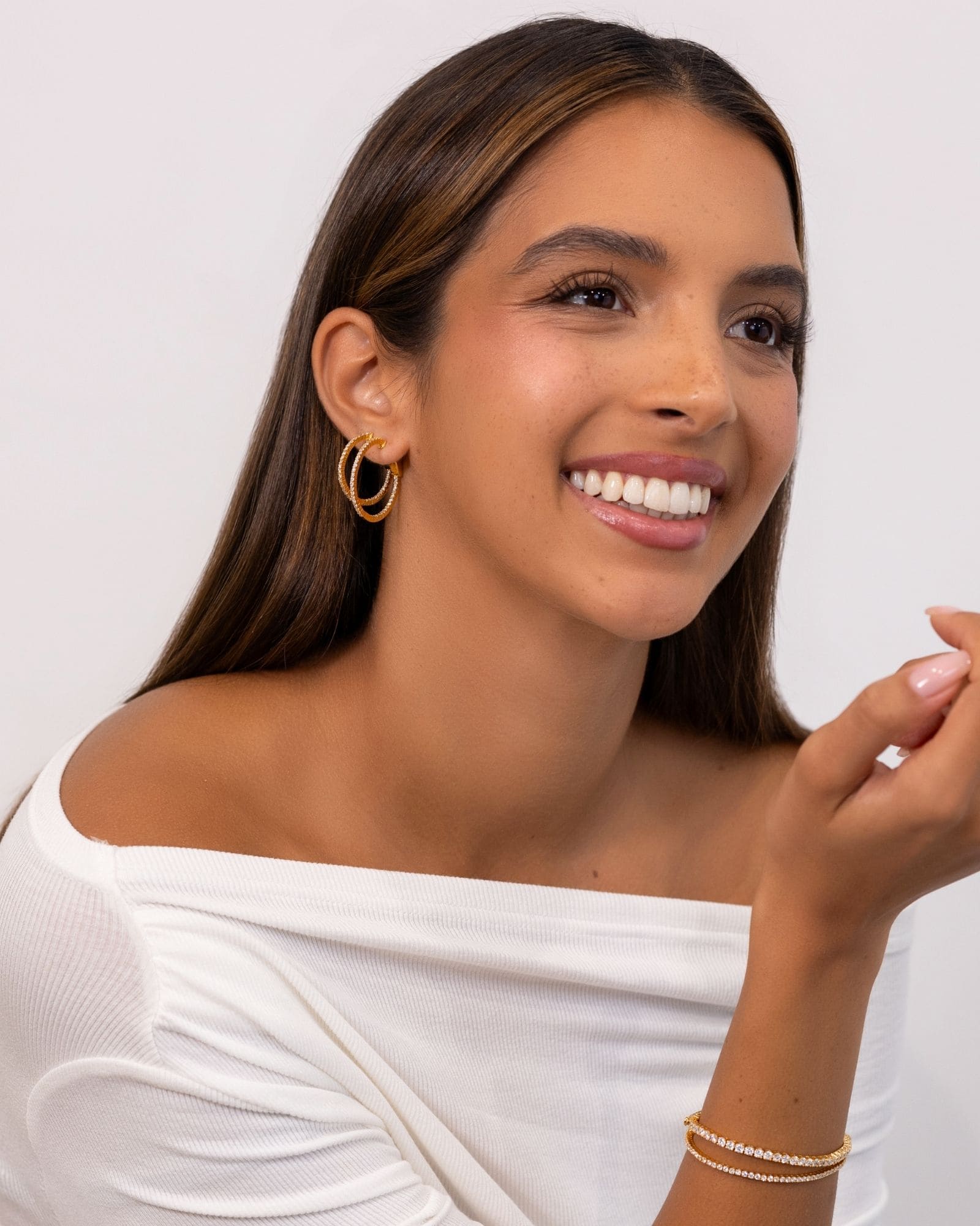 Madrid Gold Diamond Hoop Earrings by Lavana on model in 18k gold vermeil brilliant round cut pave lab grown diamonds