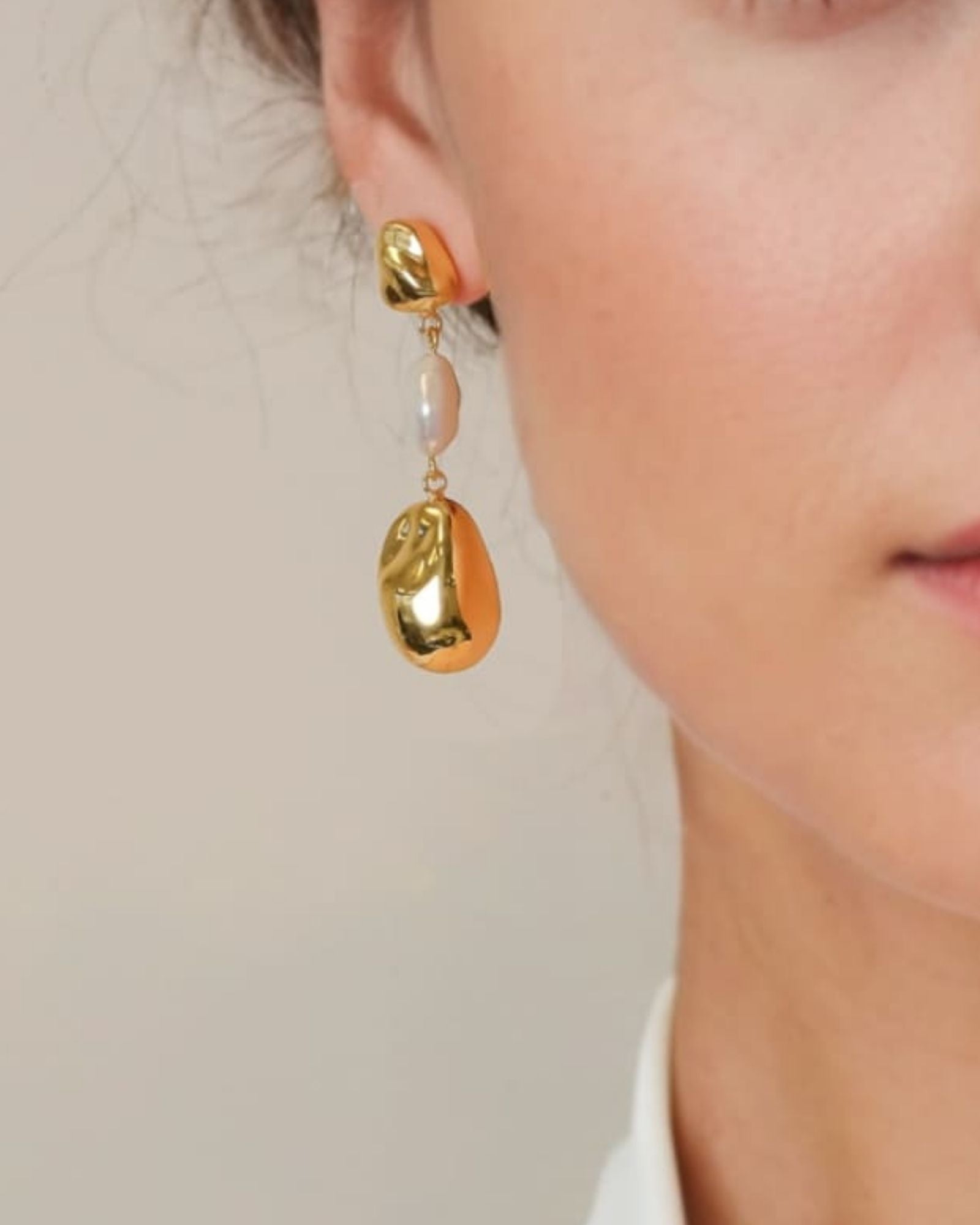 Majorca Gold Pearl Drop Earrings by LAVANA on model organic open curves with central freshwater pearl